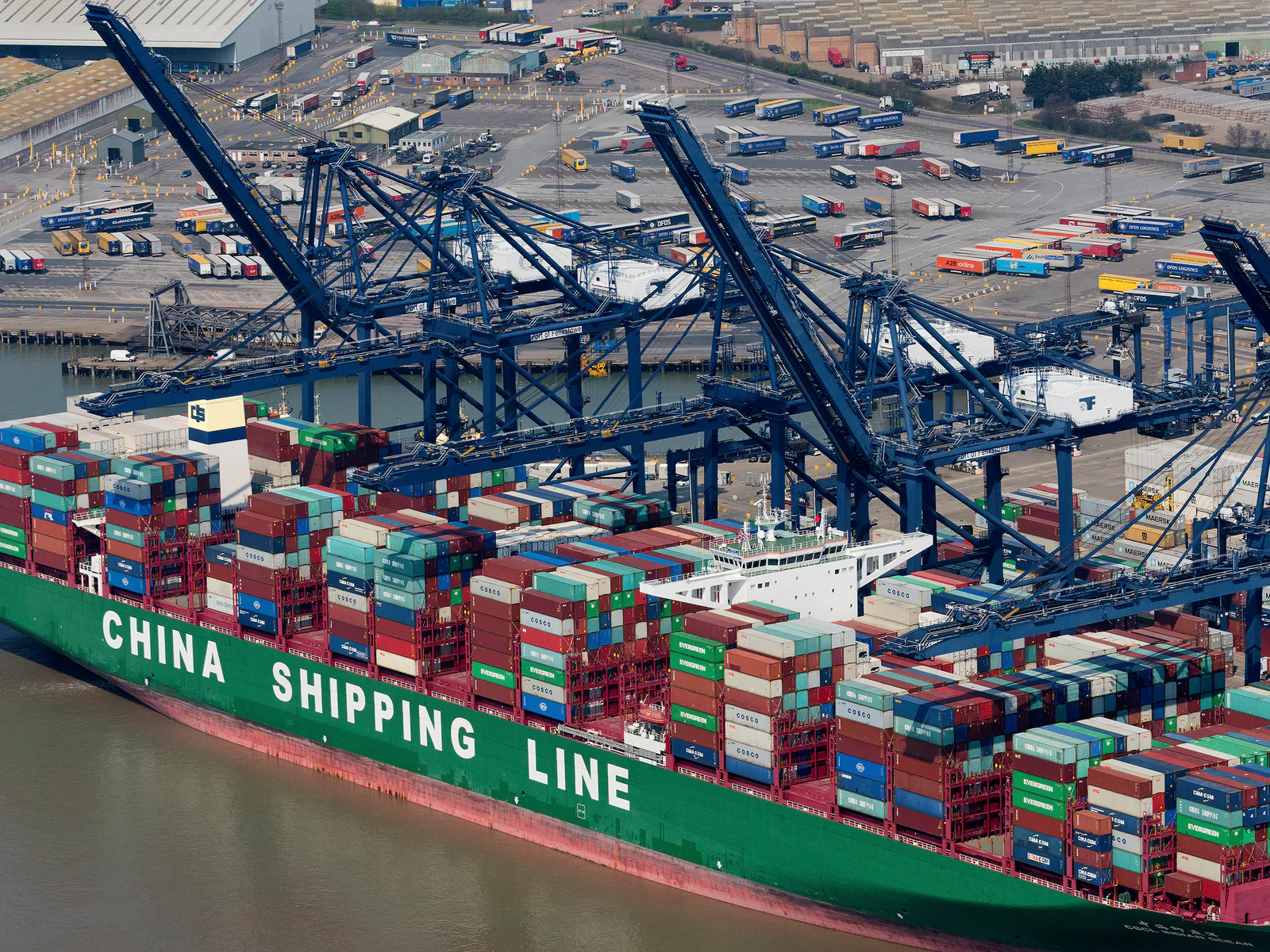 Container ship beneath gantry cranes at the Port of Felixstowe